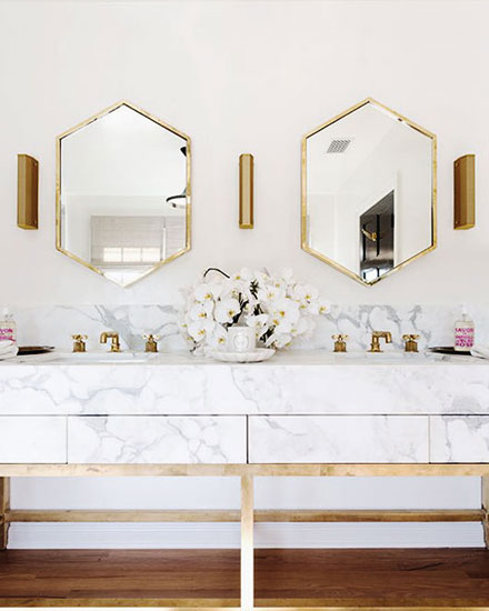 Bathroom interior design with gold accents 